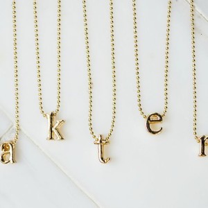 lower case initial necklace